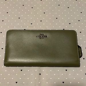 Coach wallet with snap closure